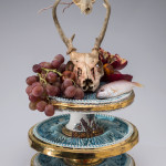 Sherman_PlattersVasesWithFishGrapesBerriesPomegranateDeerSkulls