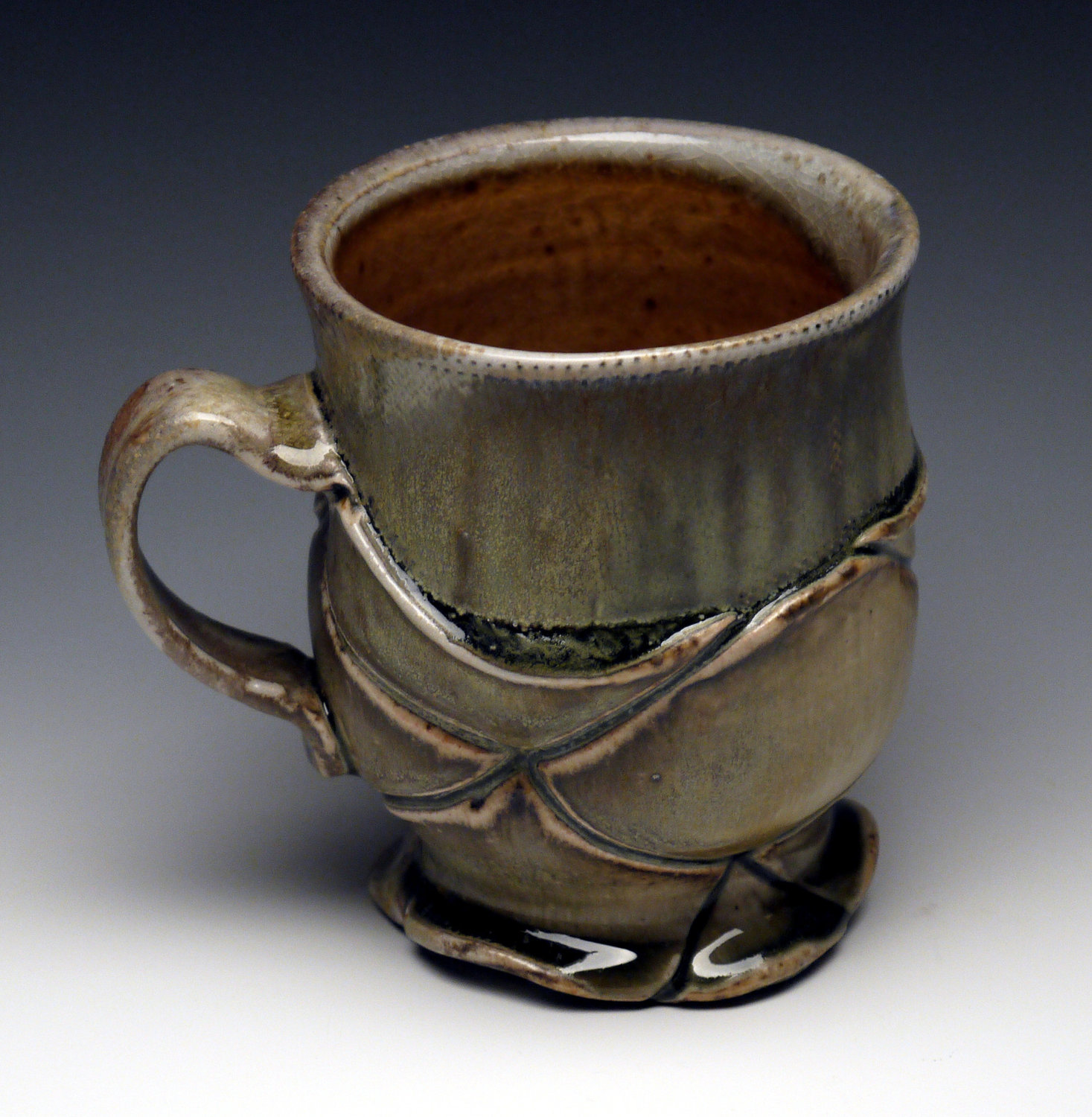 Coffee / Tea Cup, green celadon, shino glaze, wood fired porcelain Coffee / Tea Cup, green celadon, shino glaze, wood fired porcelain