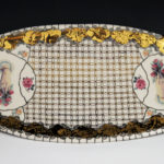 “Main avec fleurs”, Platter