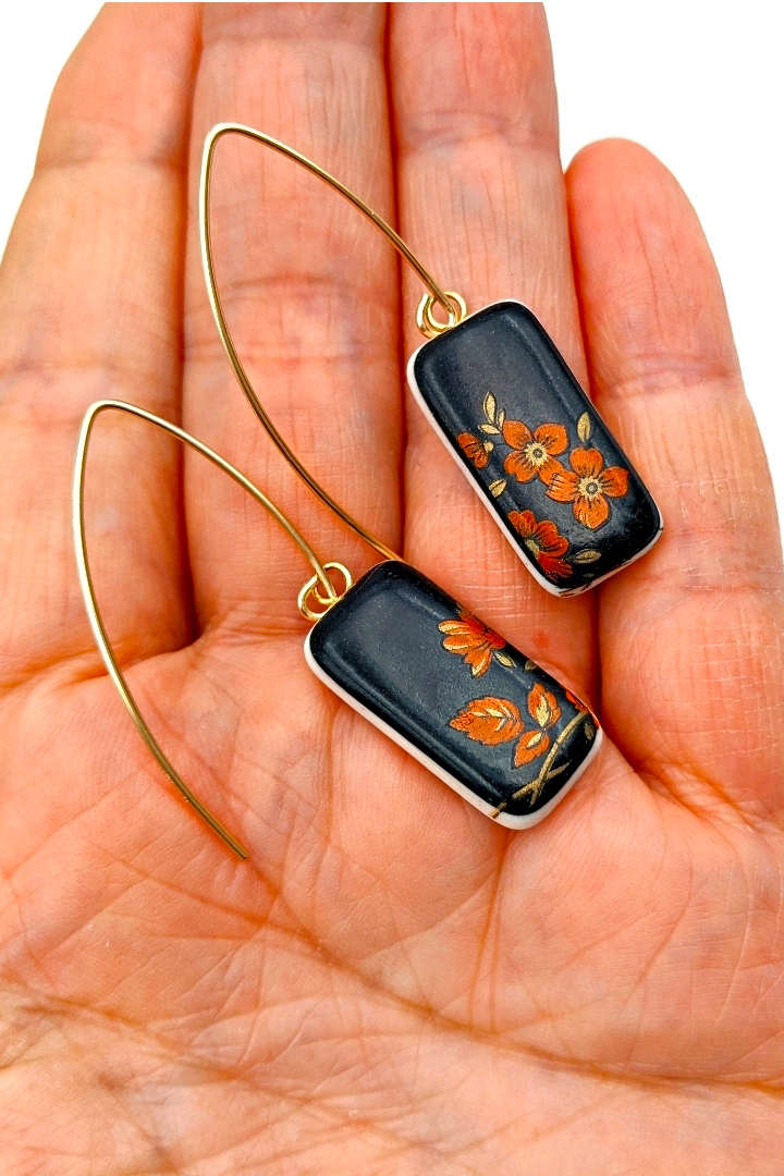 03-03-Dangles-Red-Gold-Black-Porcelain-Flower-Melanie-Sherman-Ceramics-Jewelry-Cerbera-Gallery