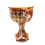 Just A Little Tipsy (#1) | 2024 | h 5.75″ x d 4″ | Porcelain, Glaze, Overglaze, 24k Gold Luster, Orange Luster, Platinum Transfers, Vintage Flower Decals